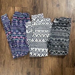 3 pair of leggings, various sizes all fit small